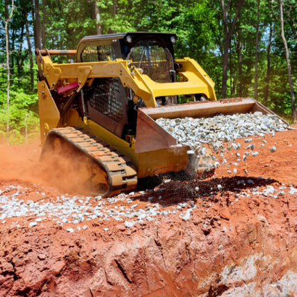 Contractor RentalsA skidsteer carrying gravel in it's bucket