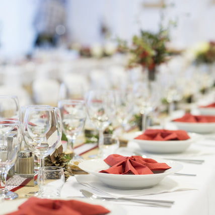 WeddingA wedding table set up with salmon linens and glassware